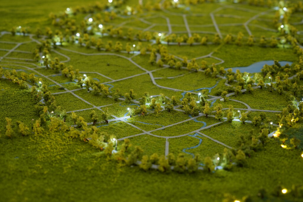 vecteezy_miniature-of-wide-view-of-the-land-from-above-in-the-center_51482751